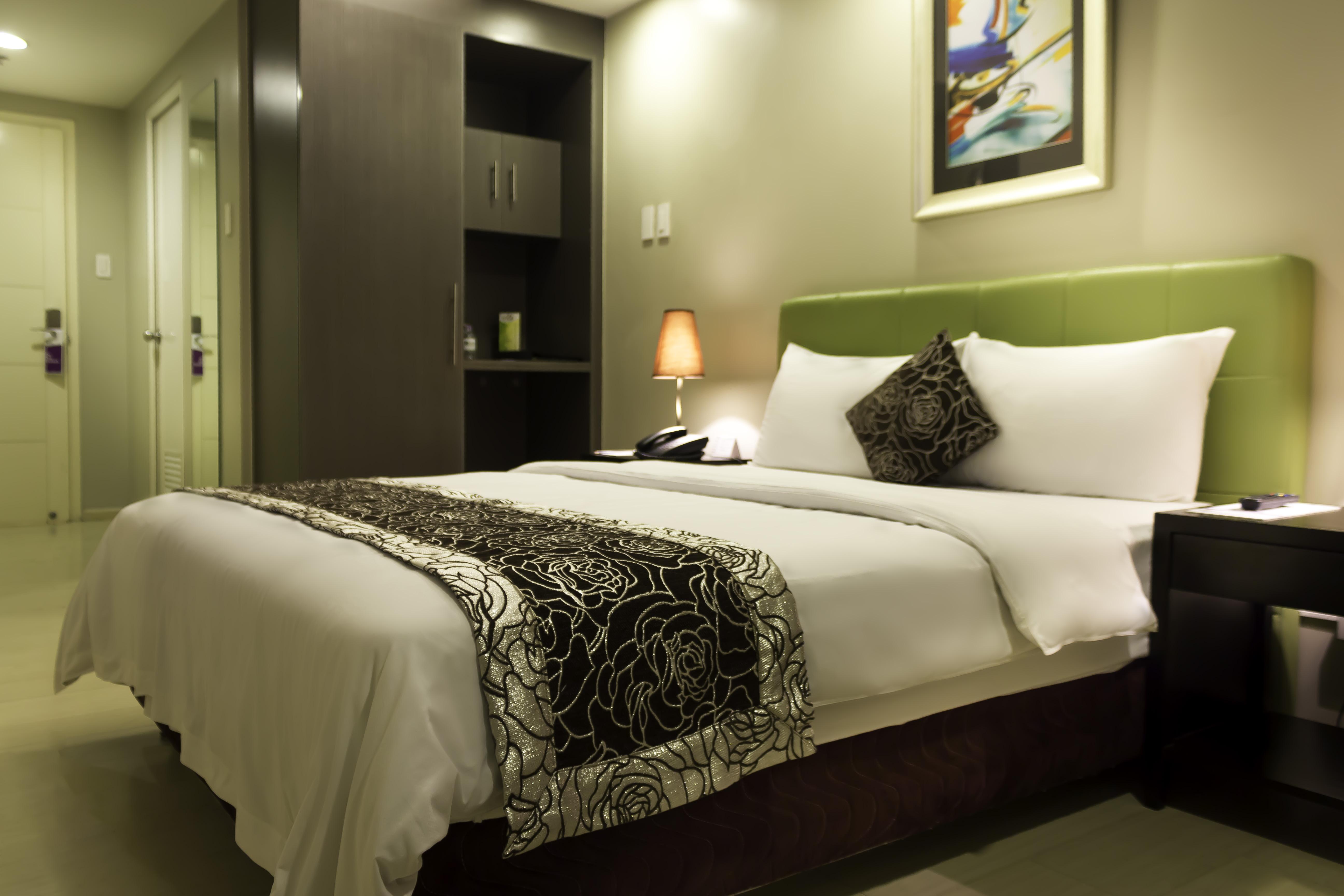 Pasig City The Exchange Regency Residence Hotel Managed By Hii מראה חיצוני תמונה