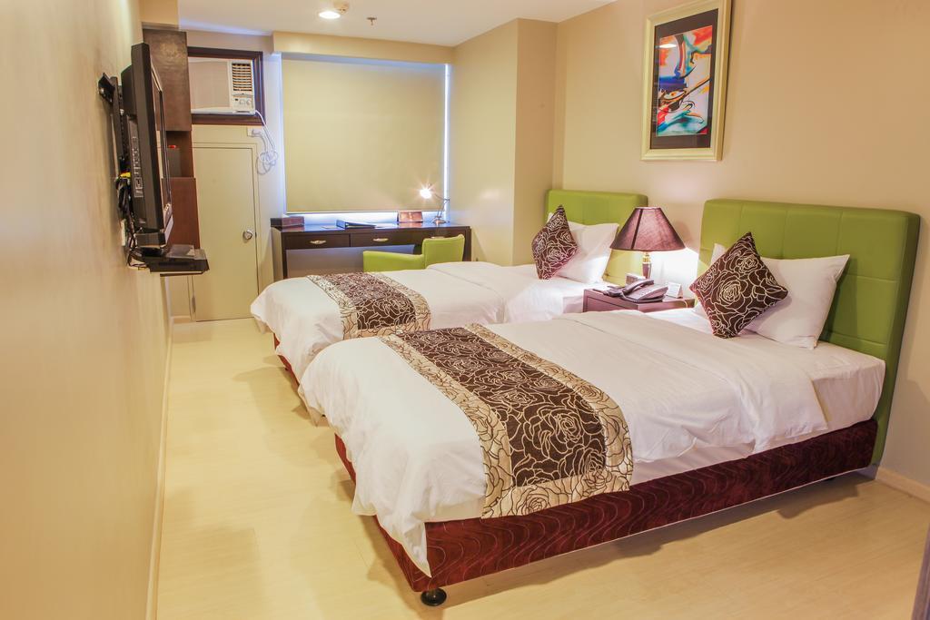 Pasig City The Exchange Regency Residence Hotel Managed By Hii מראה חיצוני תמונה